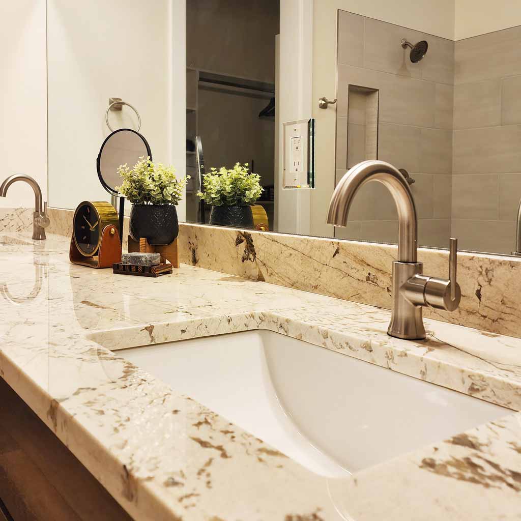 Bathroom countertop installation with custom vanity surfaces in a Southern Utah home